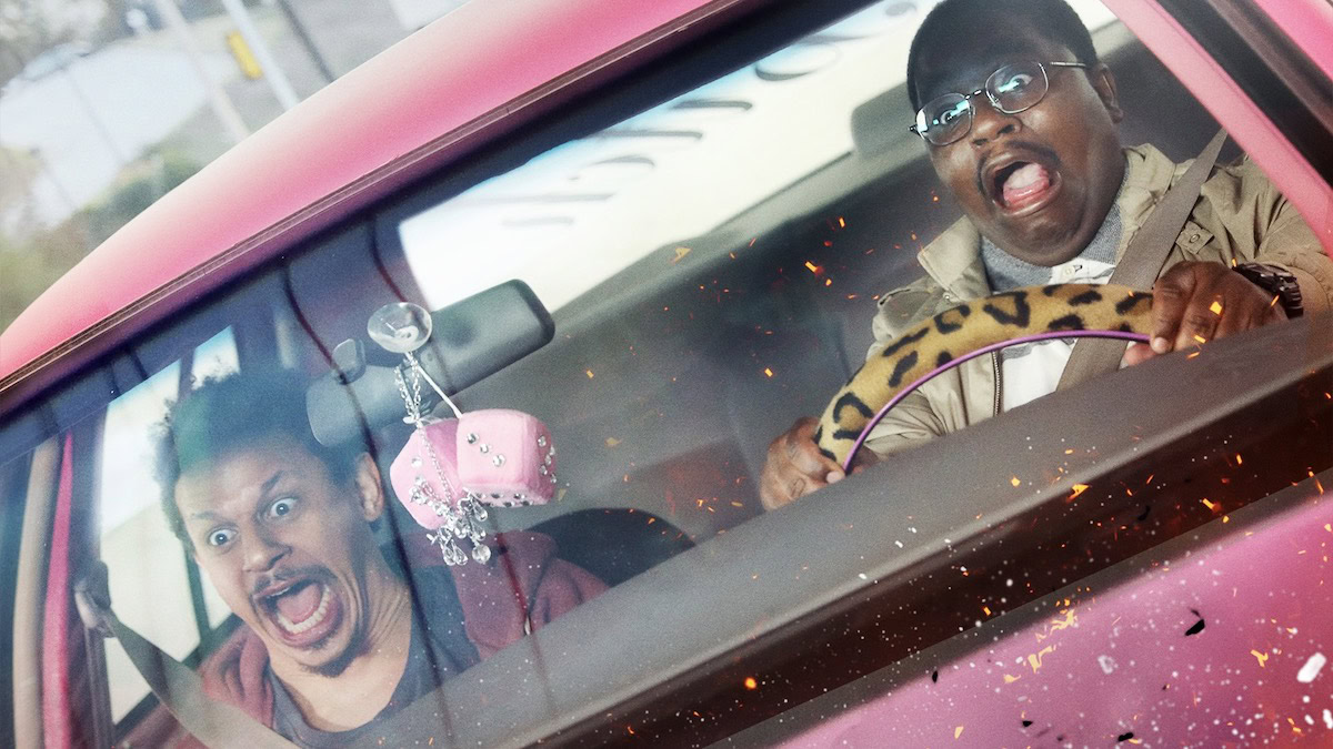 Eric Andre and Lil Rel Howery in a car in Bad Trip - best funny movies on netflix