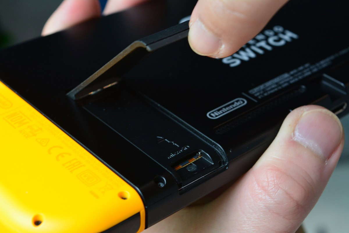 How to put an SD card in a Nintendo Switch - Android Authority