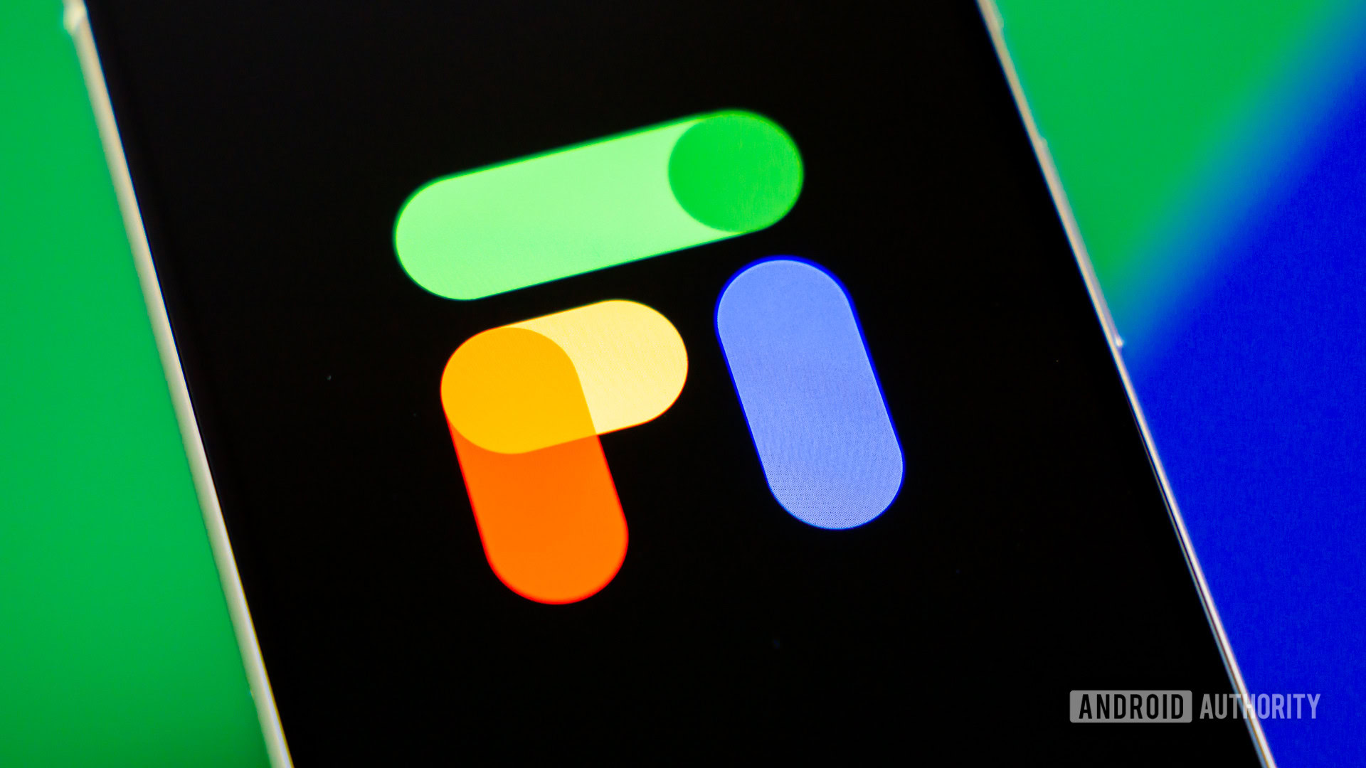 Stock photo of Google Fi logo on phone with colorful background 2