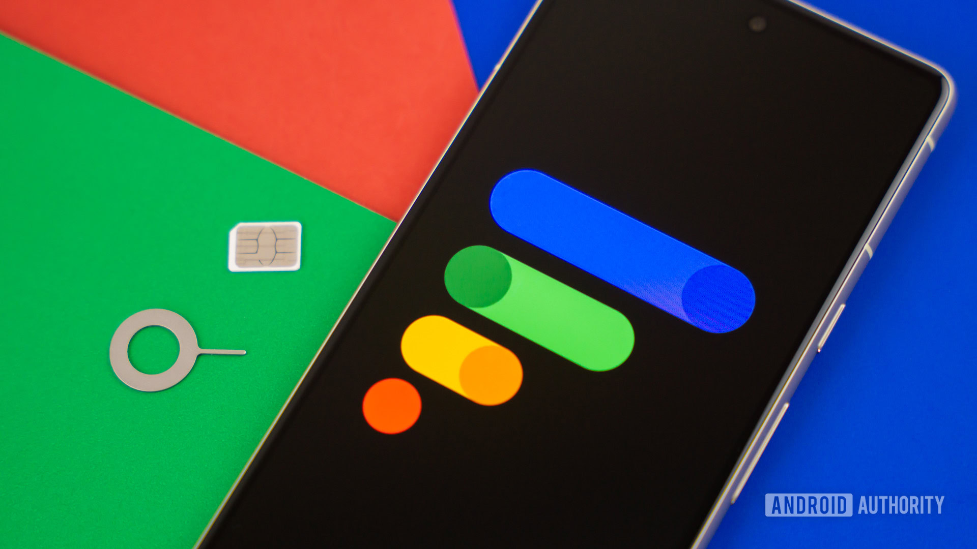 Google Fi Wireless logo on smartphone with SIM card and SIM ejector next to it Stock photo 1