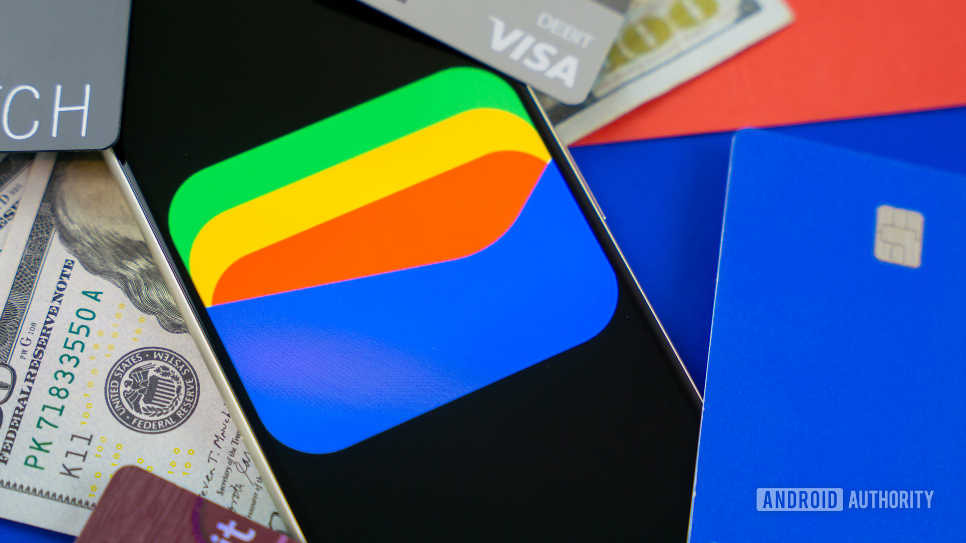 Google Wallet logo on smartphone next to credit cards and cash Stock photo 8