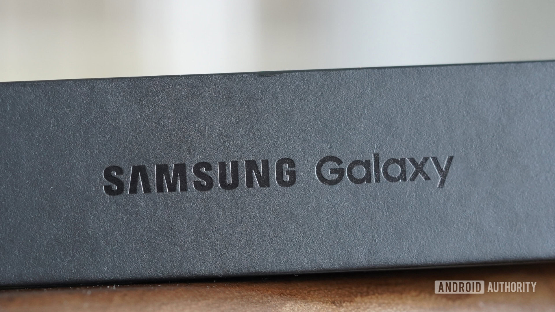 A box with the Samsung logo lies on a table.