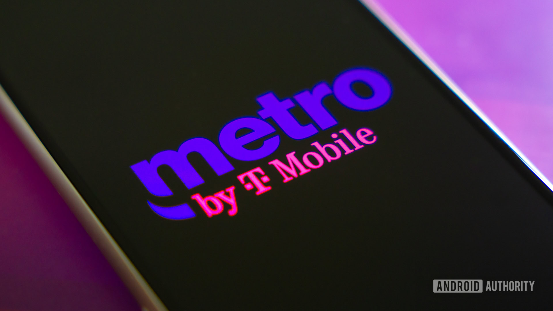 Metro by T Mobile logo on smartphone