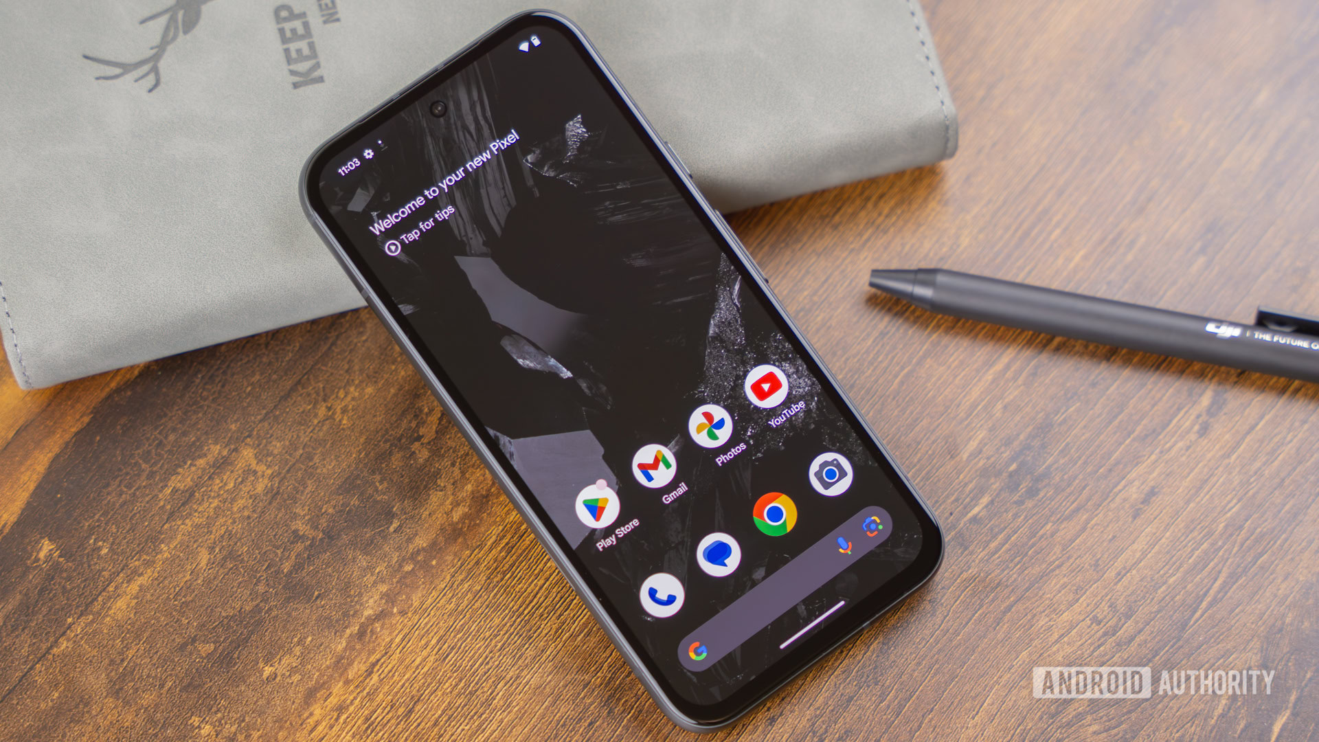 Google Pixel 8a screen on table with screen on stock photo