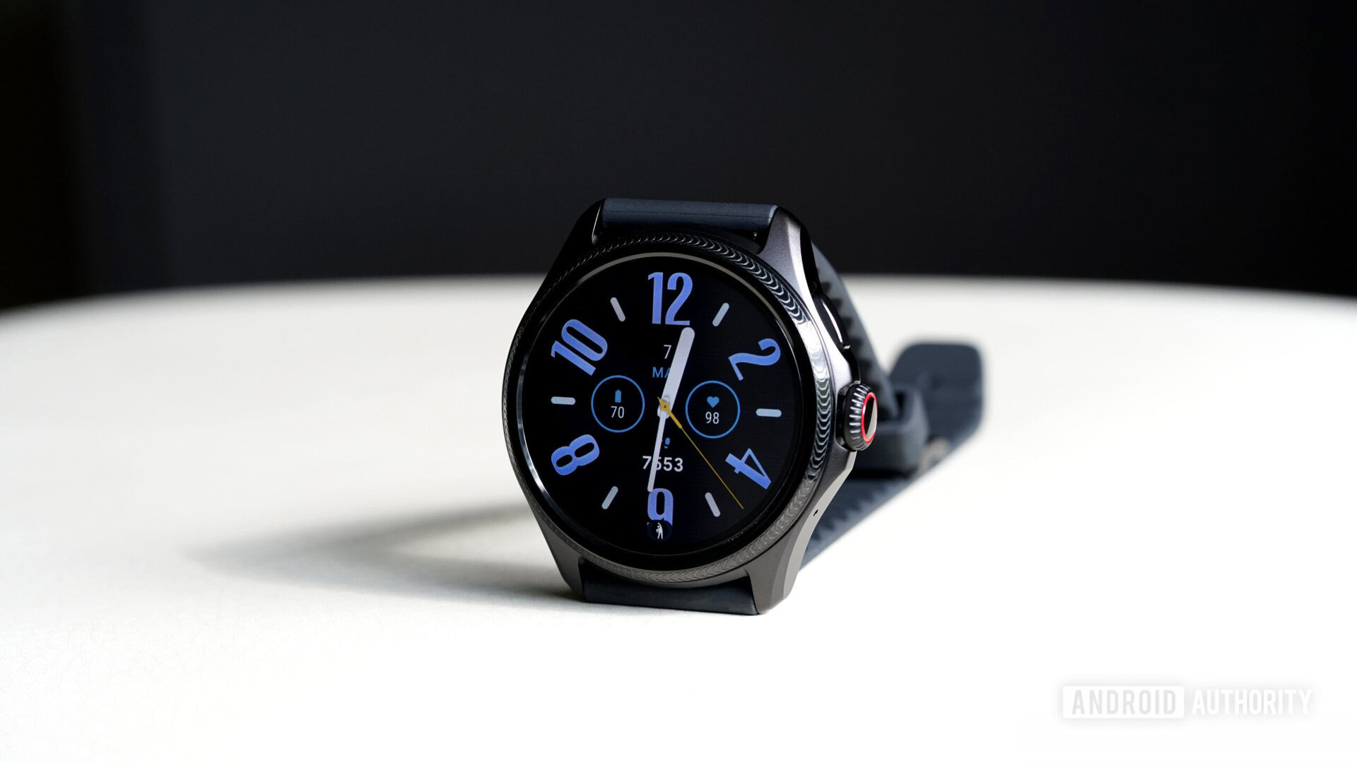 A Mobvoi TicWatch Pro 5 Enduro displays a native watch face.