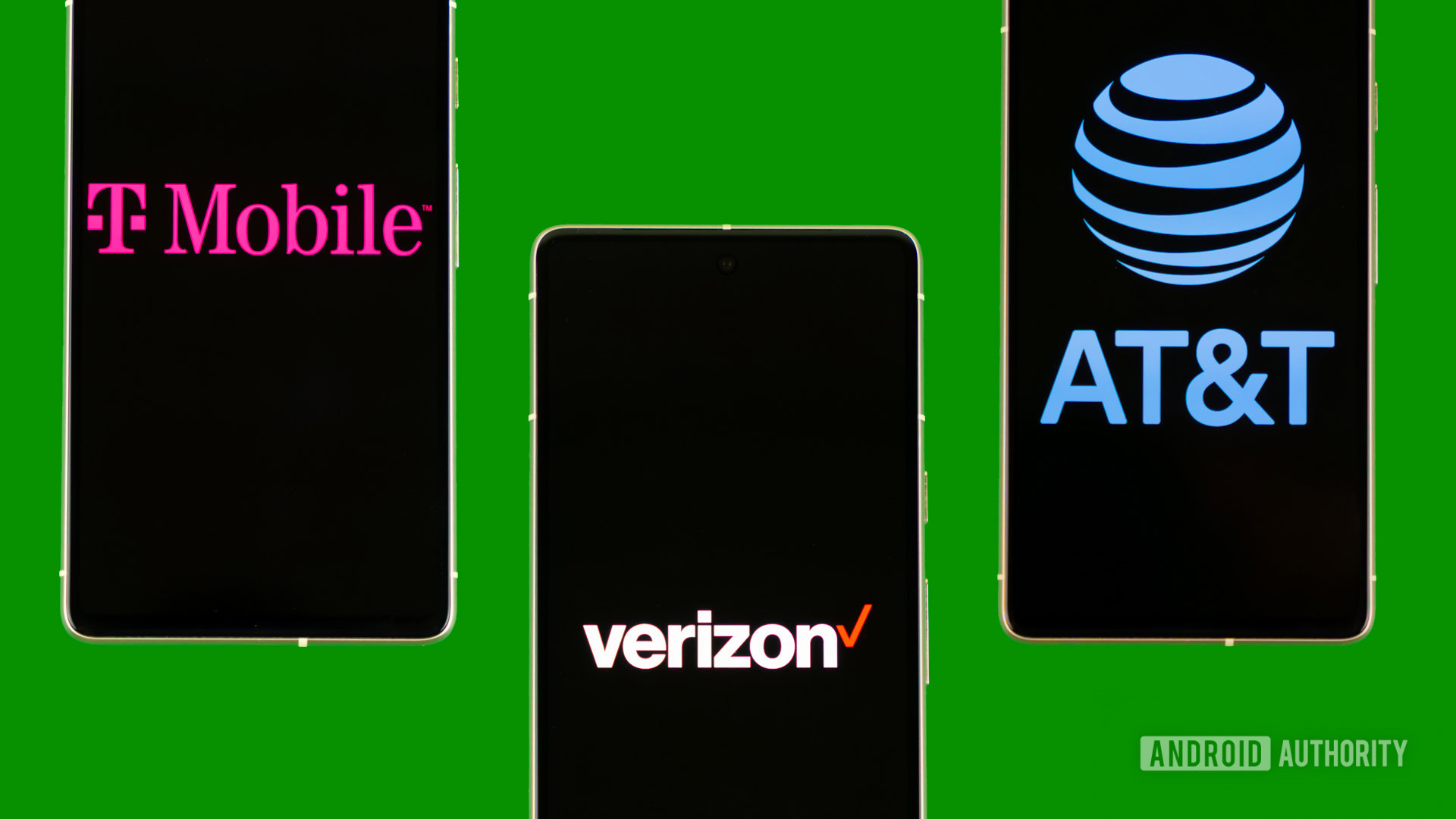 Phones showing Verizon, AT&T, and T Mobile logos stock photo (2)