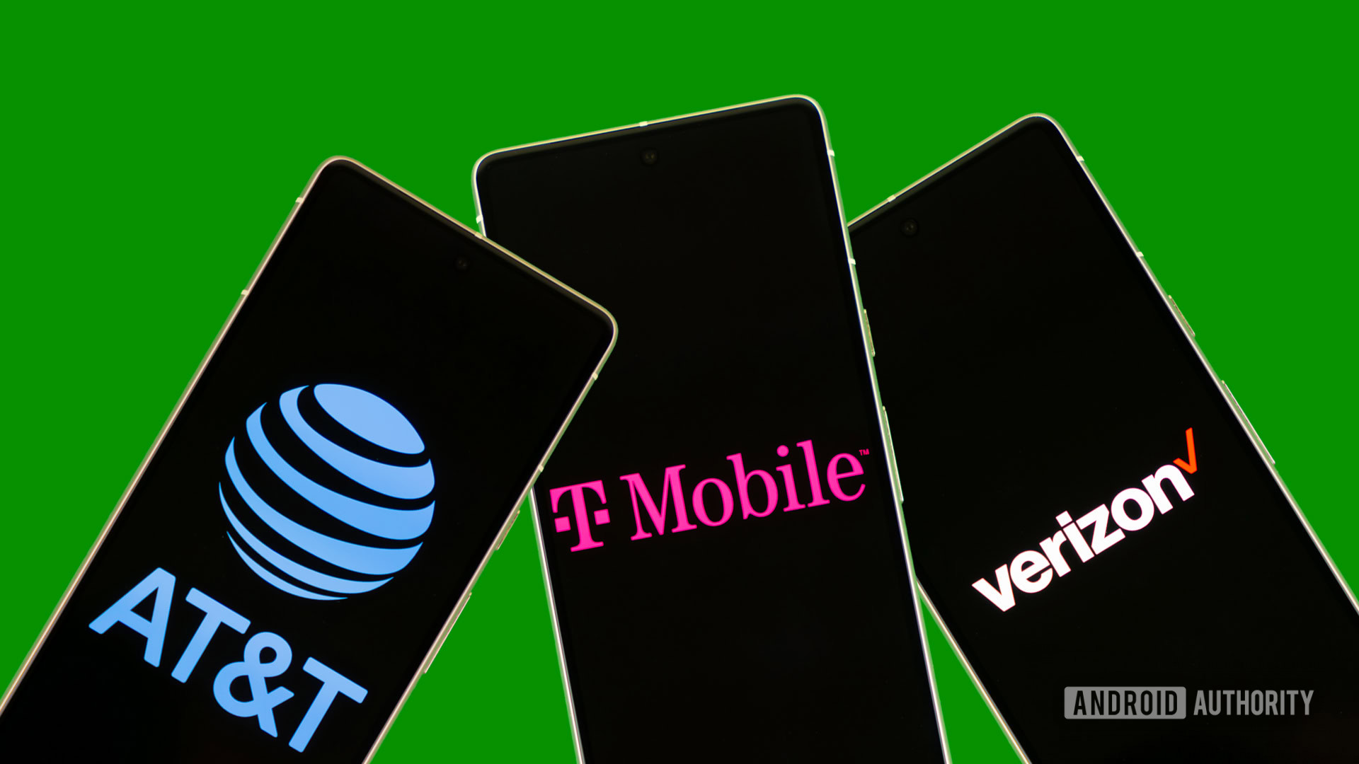 Phones showing Verizon, AT&amp;T, and T Mobile logos stock photo (4)