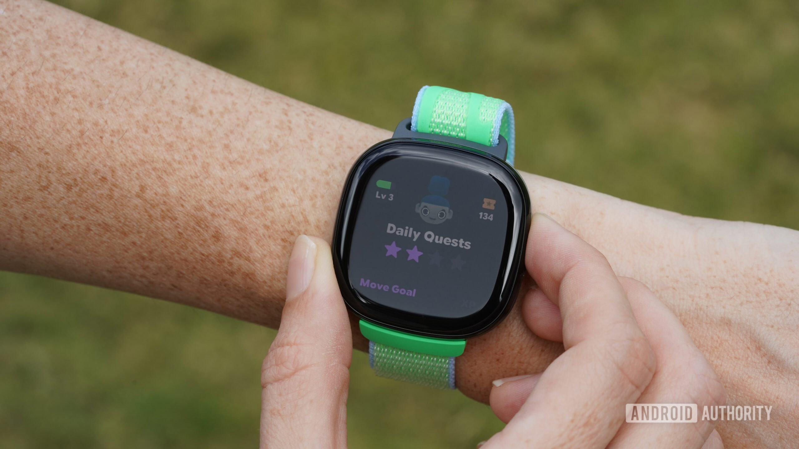 A user checks the stats on their Daily Quests screen on the Fitbit Ace LTE.