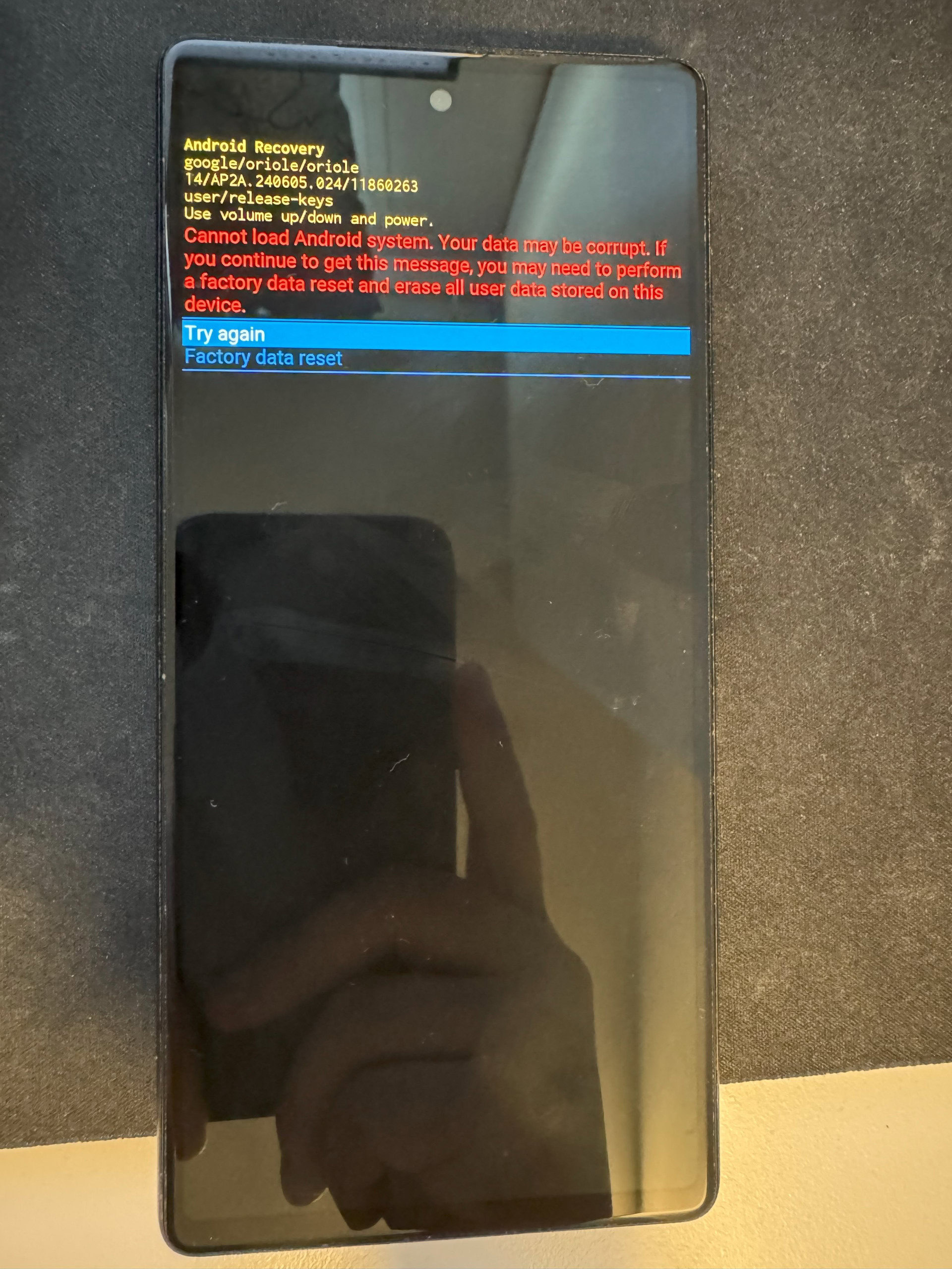 Image showing a bricked Google Pixel 6 with an error message on screen.