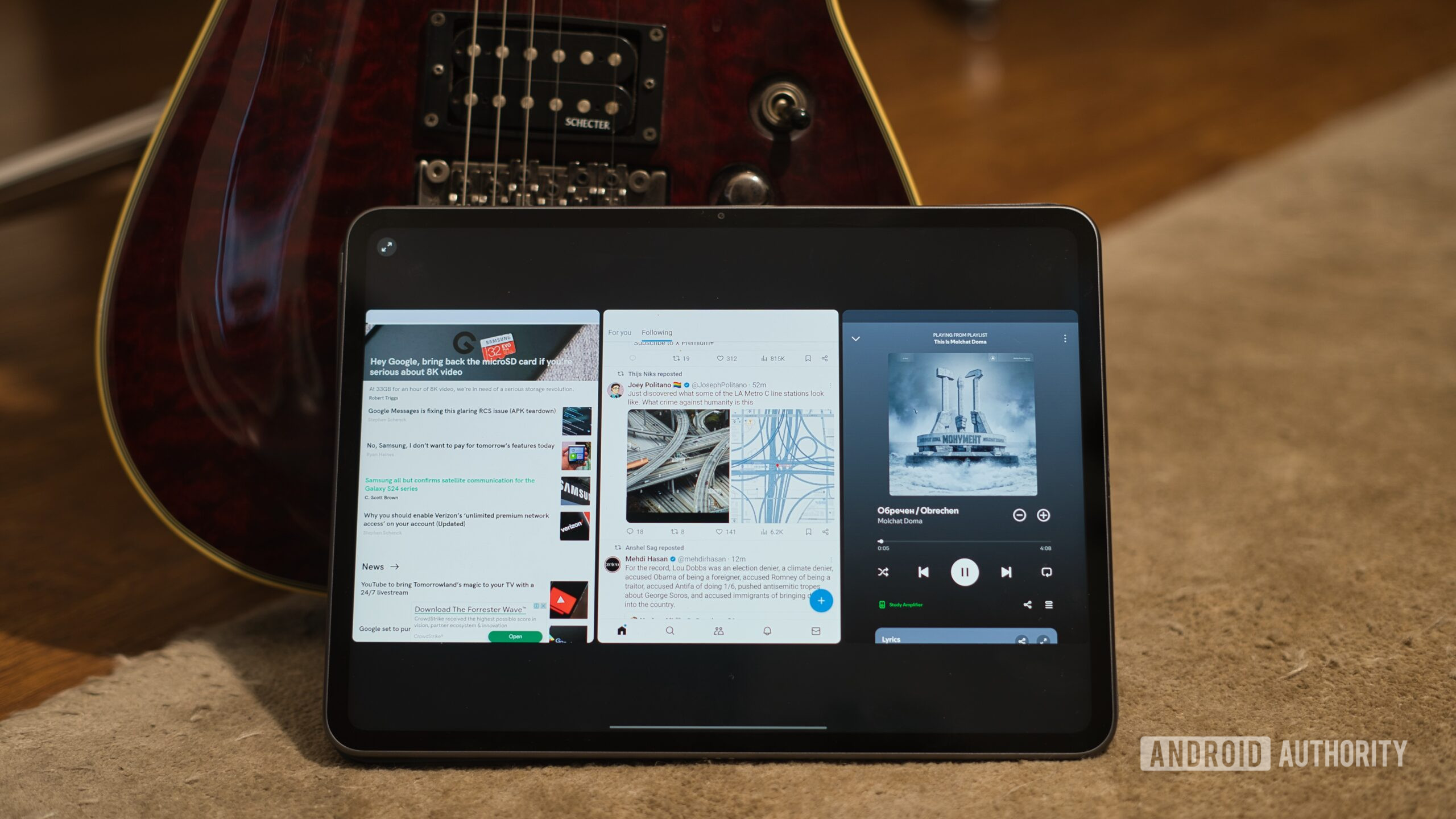 OnePlus Pad 2 Open Canvas sobre una guitarra