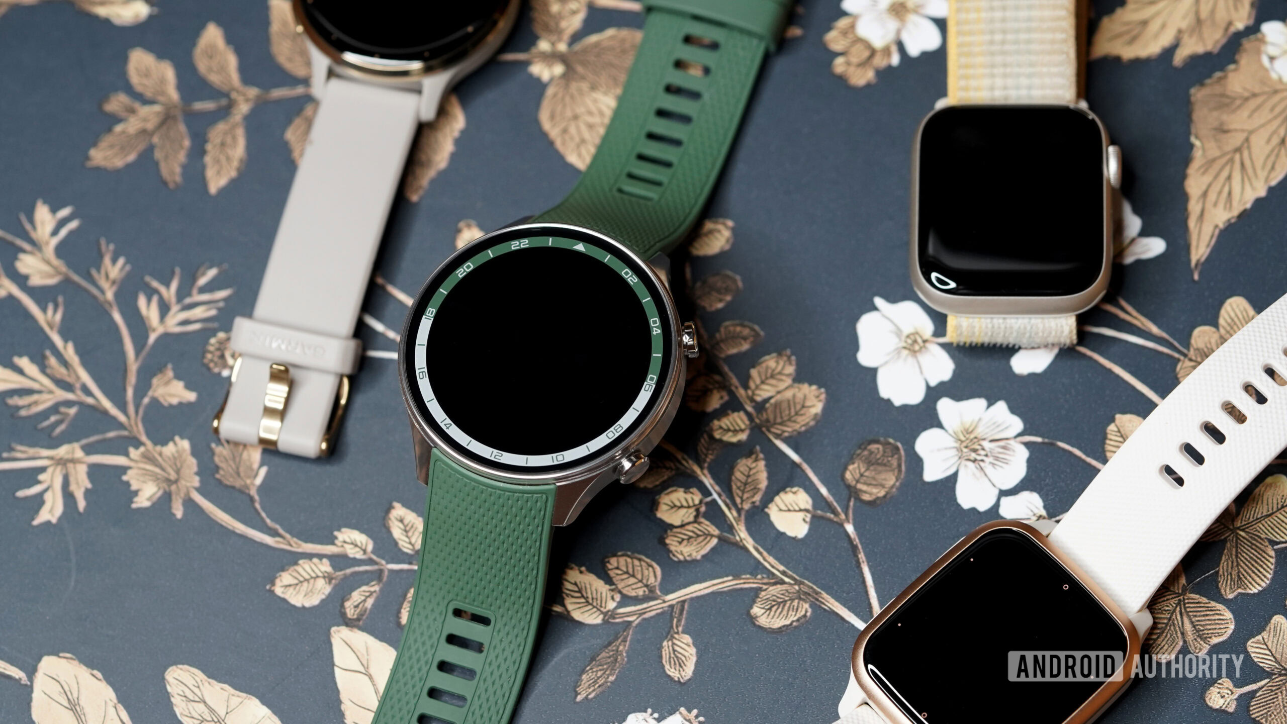 A OnePlus Watch 2R rests among alternatives from the market.