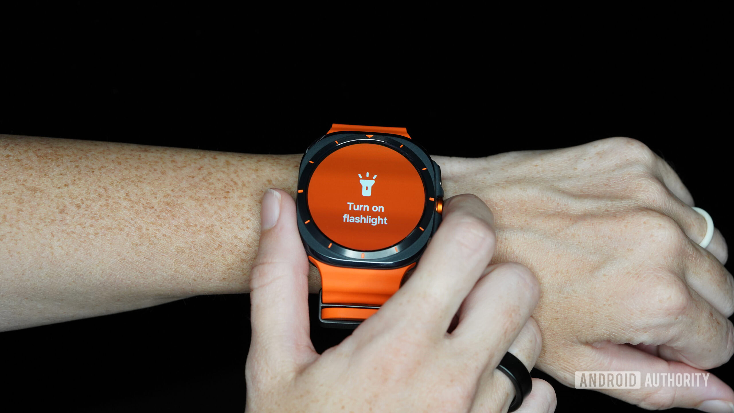 A user enables the flashlight on their Samsung Galaxy Watch Ultra.