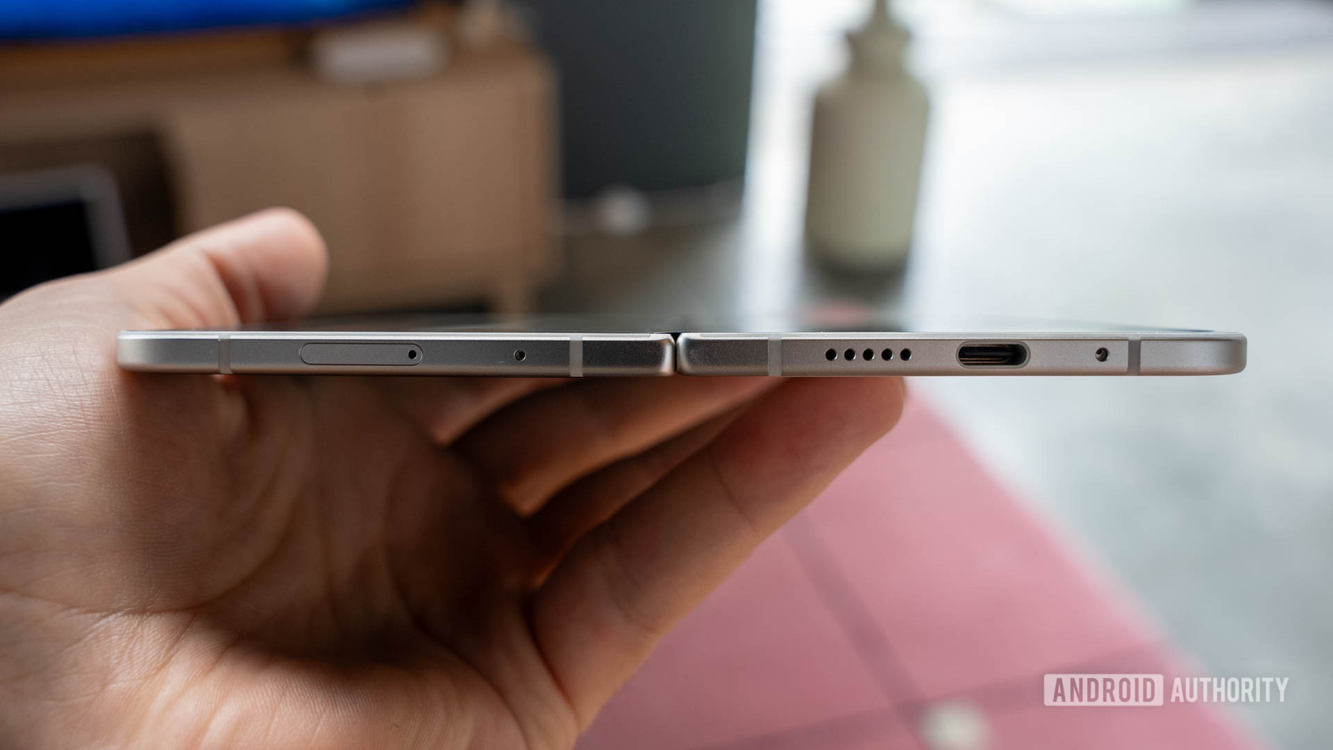 Google Pixel 9 Pro Fold fully opened shot from the bottom up showing its USB C port and how thin it is