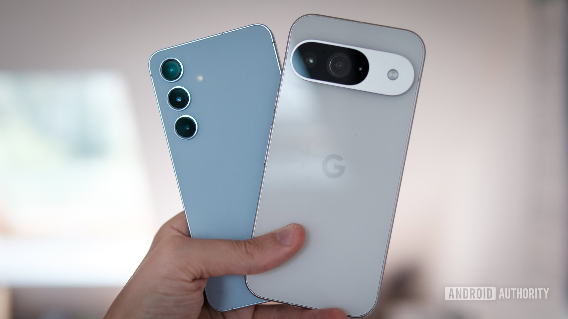 Google Pixel 9 and Samsung Galaxy S24 in hand