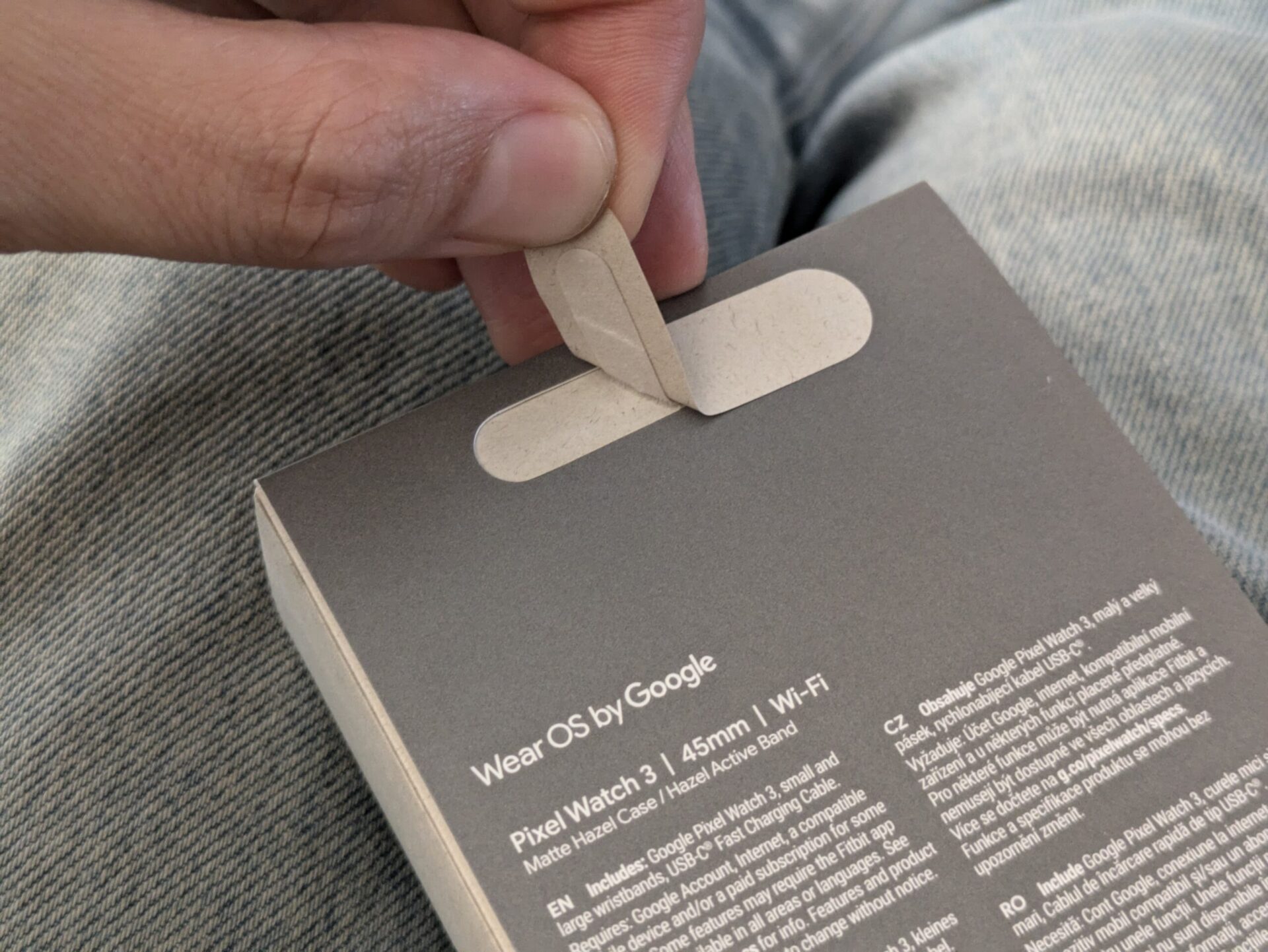 Pixel Watch 3 retail packaging pull tab.