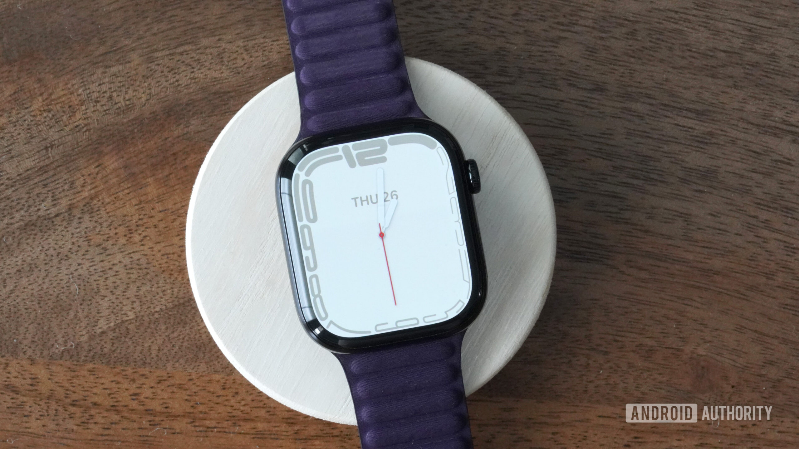 An Apple Watch Series 10 displays the watch face Contour