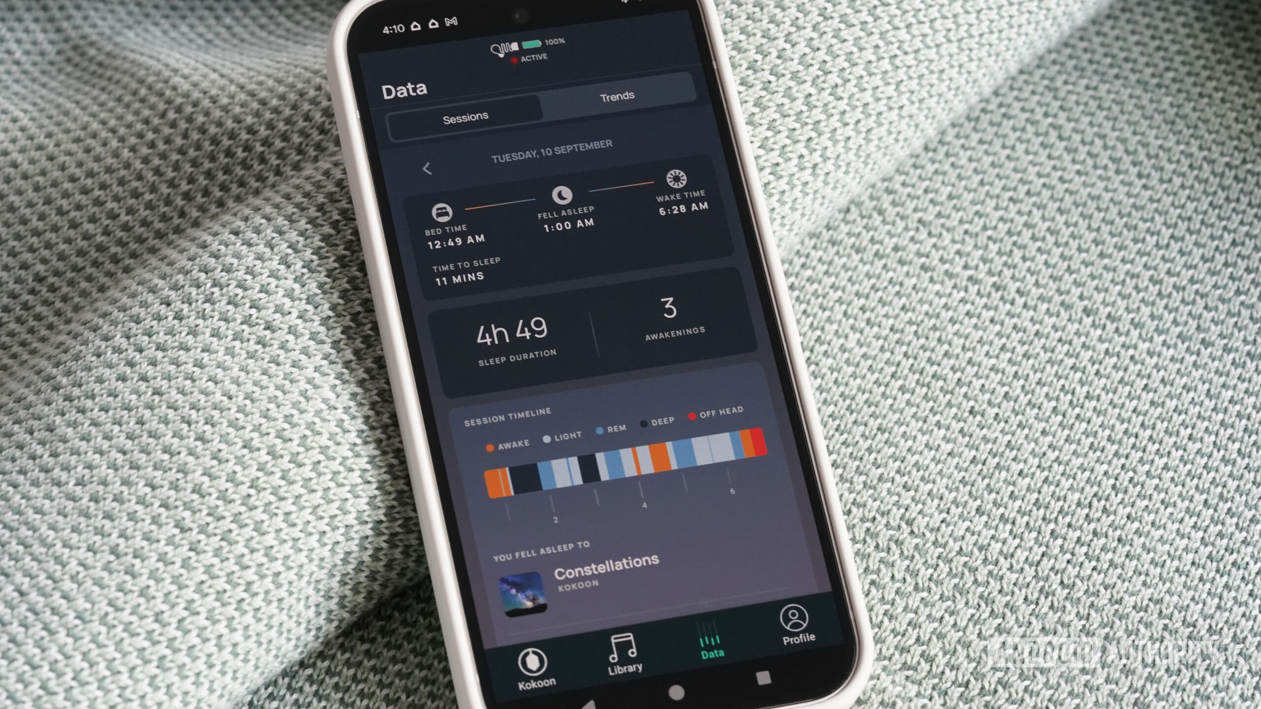 A user reviews their sleep data in the Kokoon app.