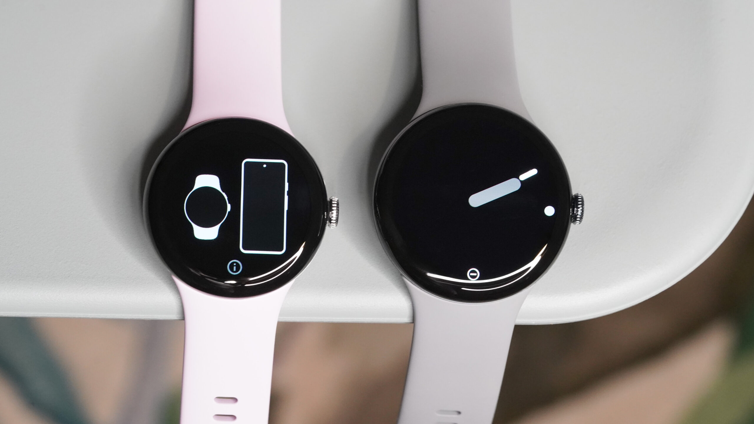 A 41mm Pixel Watch 3 rests alongside a 45mm model.