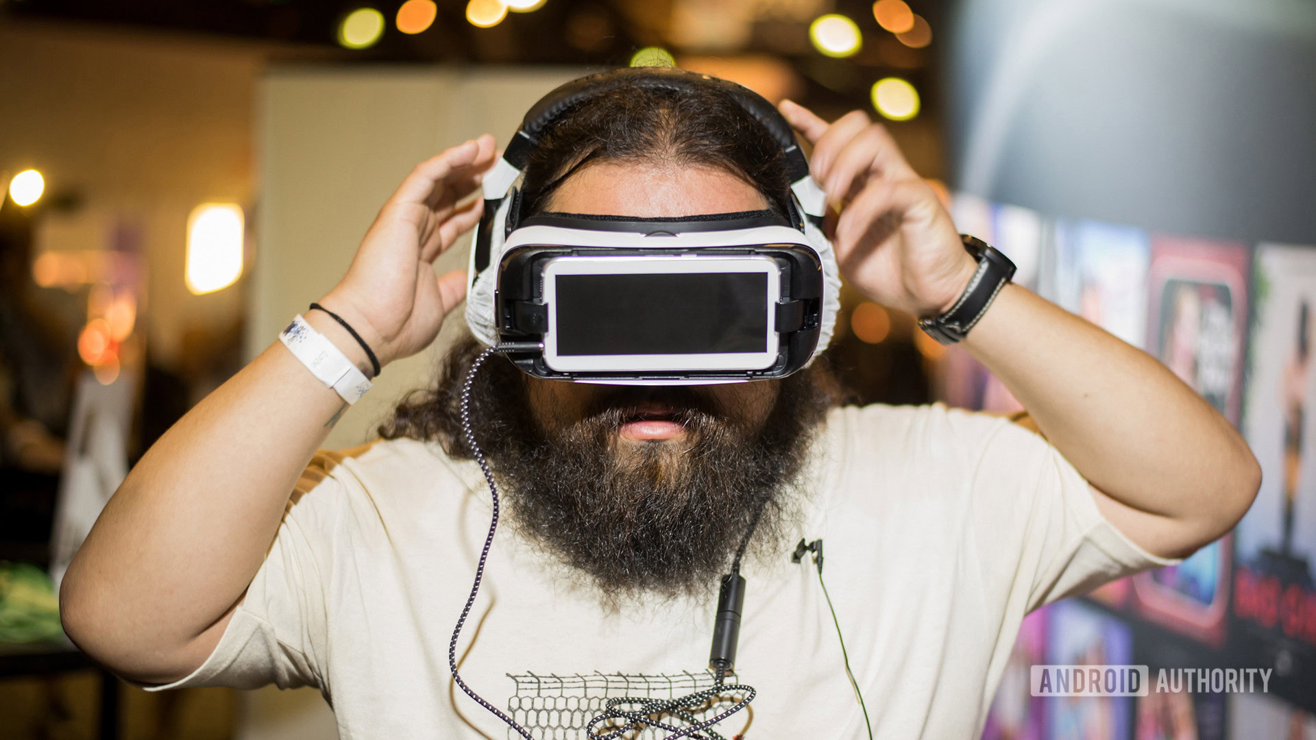 Edgar putting on a virtual reality headset