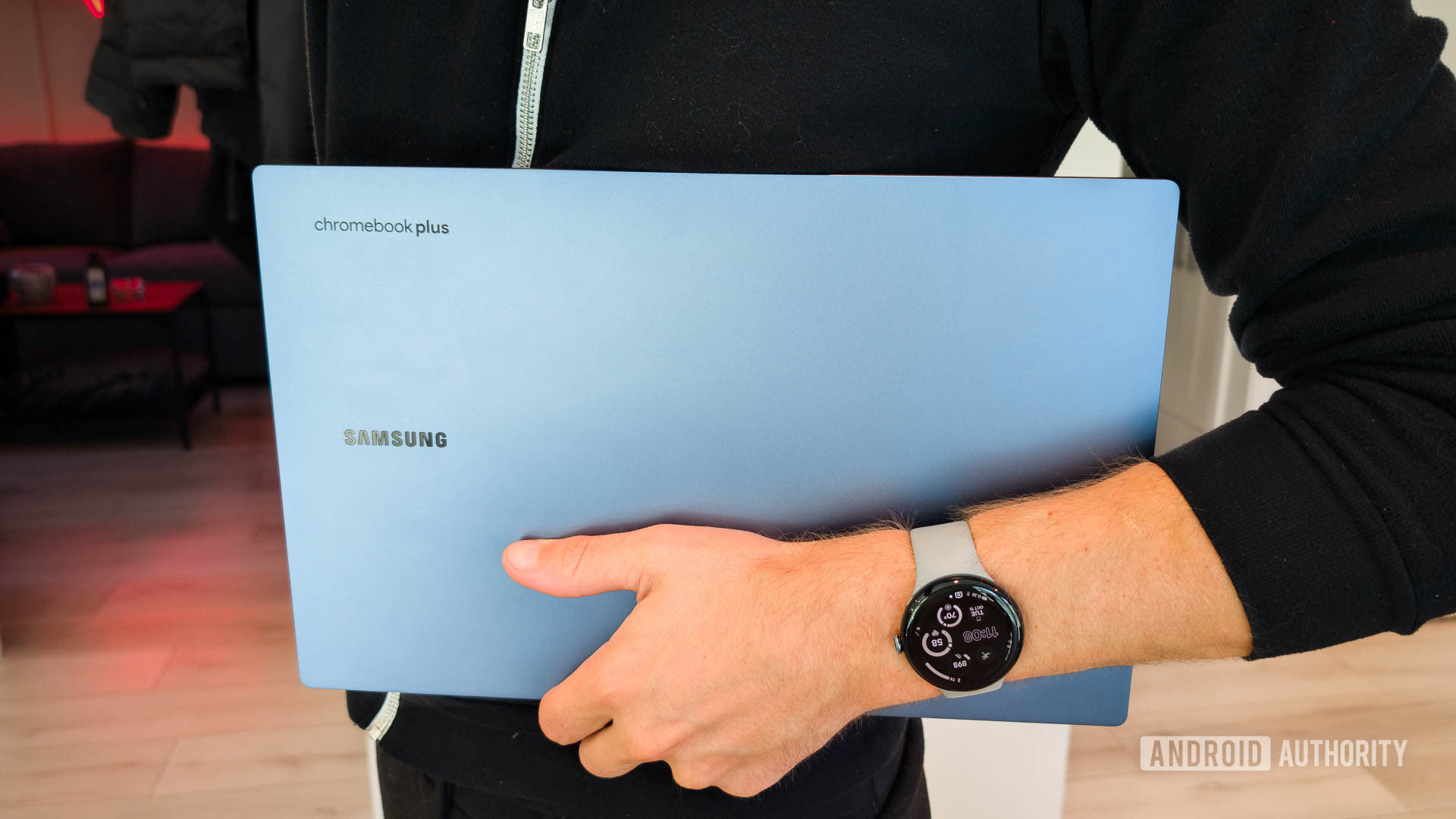 Samsung Galaxy Chromebook Plus Tucked Under Arm