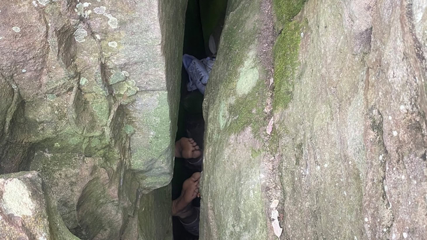 Hiker demonstrates what NOT to do if you drop your phone between boulders