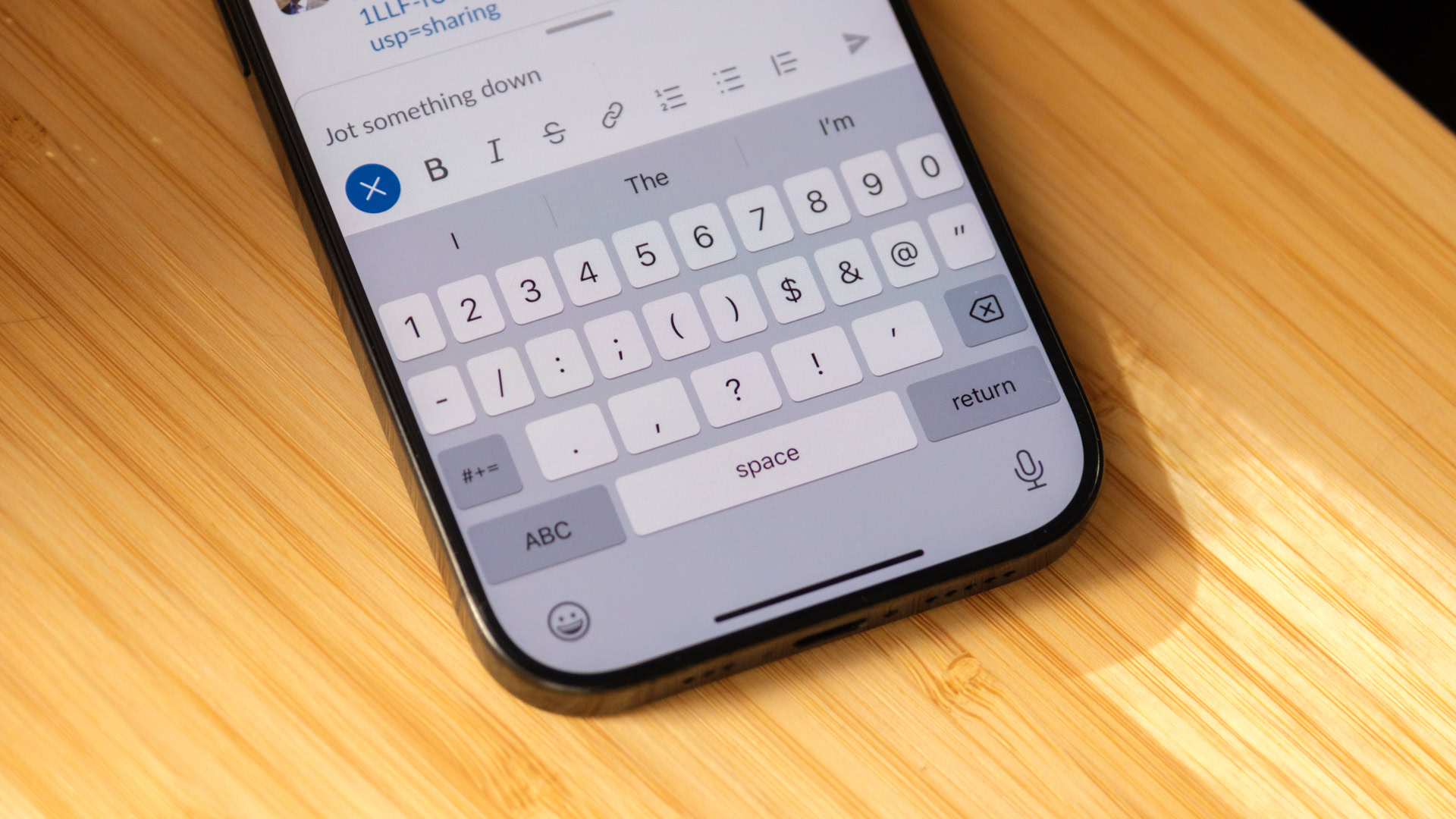 iPhone 16 Pro keyboard all the punctuation