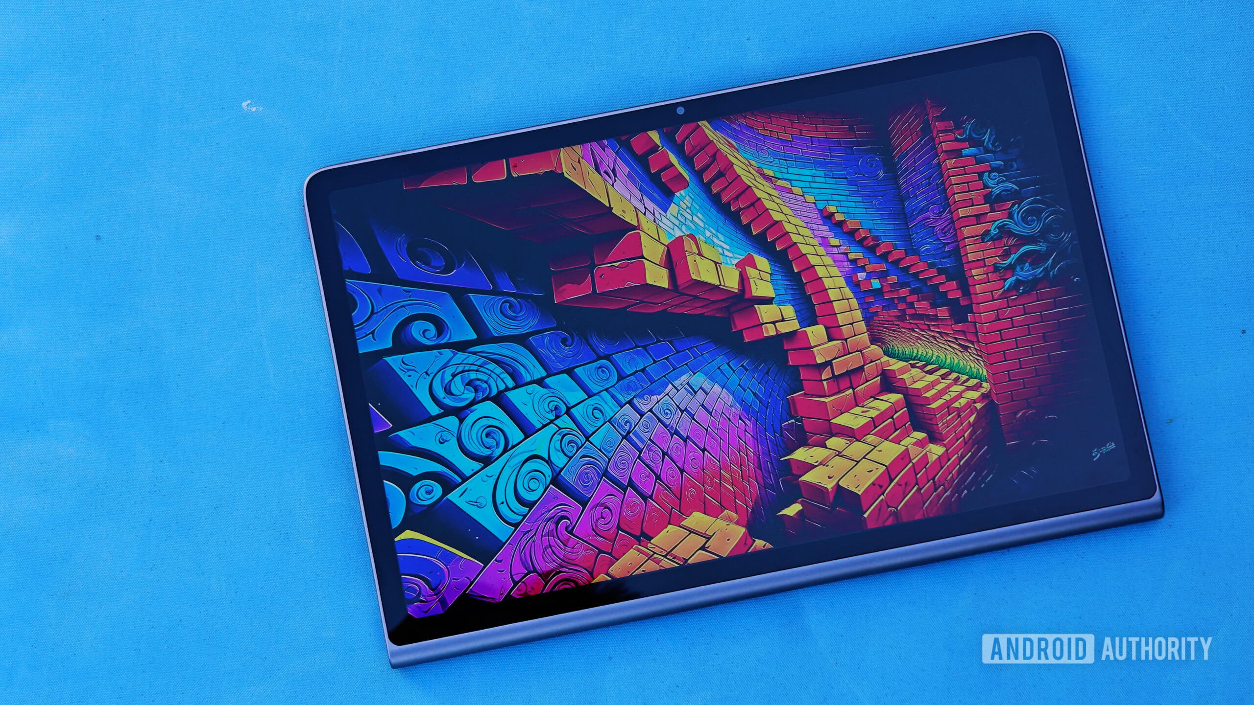 Lenovo Tab Plus review image showing a colorful picture on screen