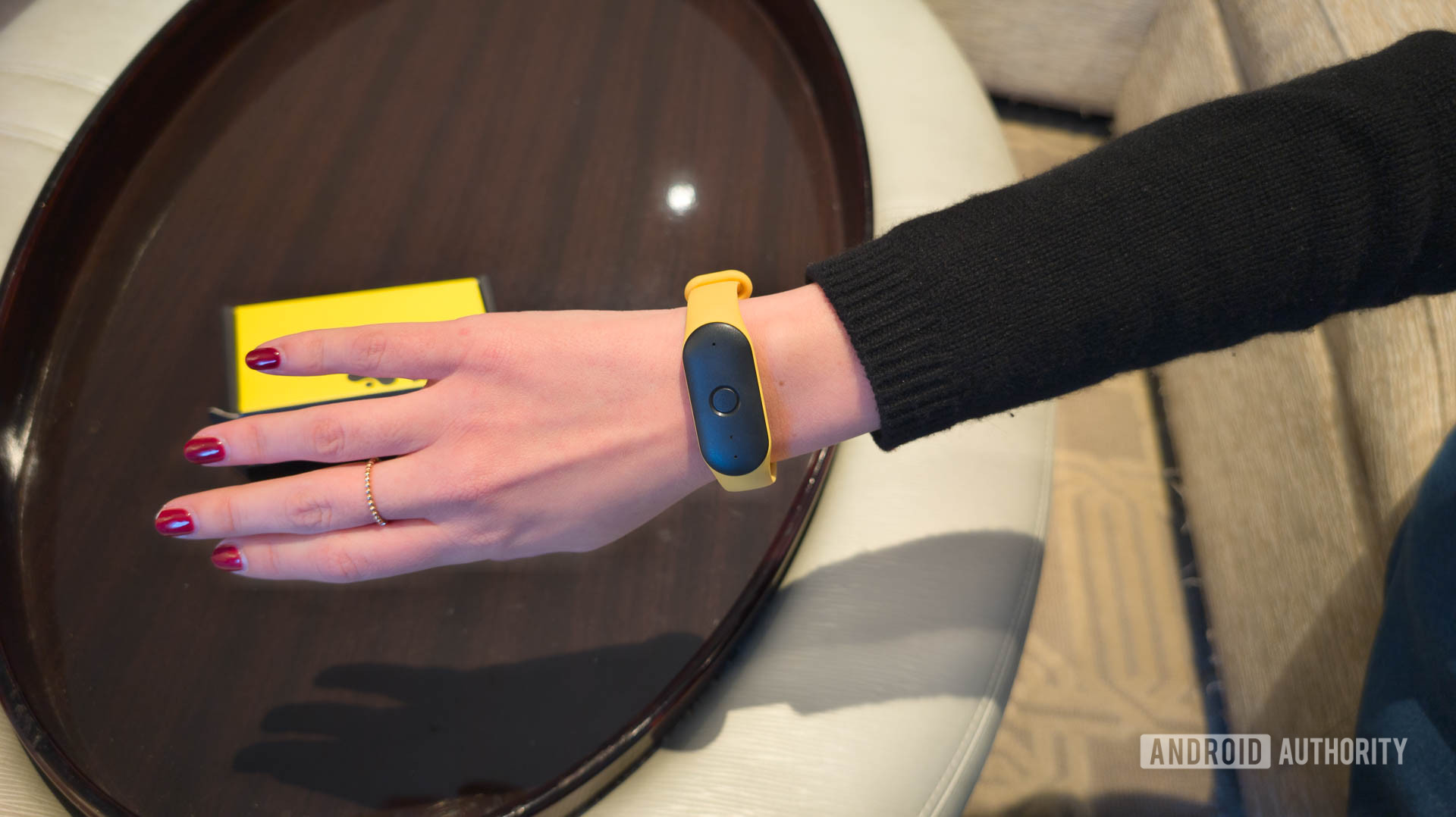 Bee AI Wearable worn on woman's wrist