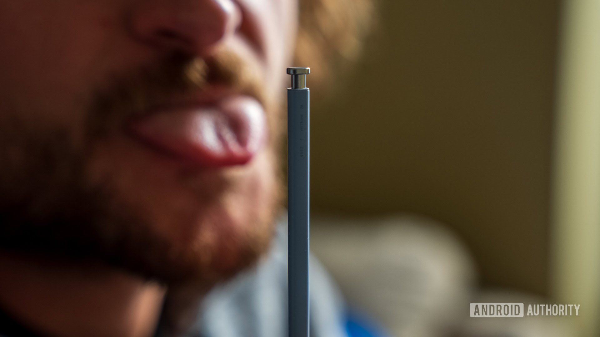 Licking a Galaxy S25 Ultra S Pen 2