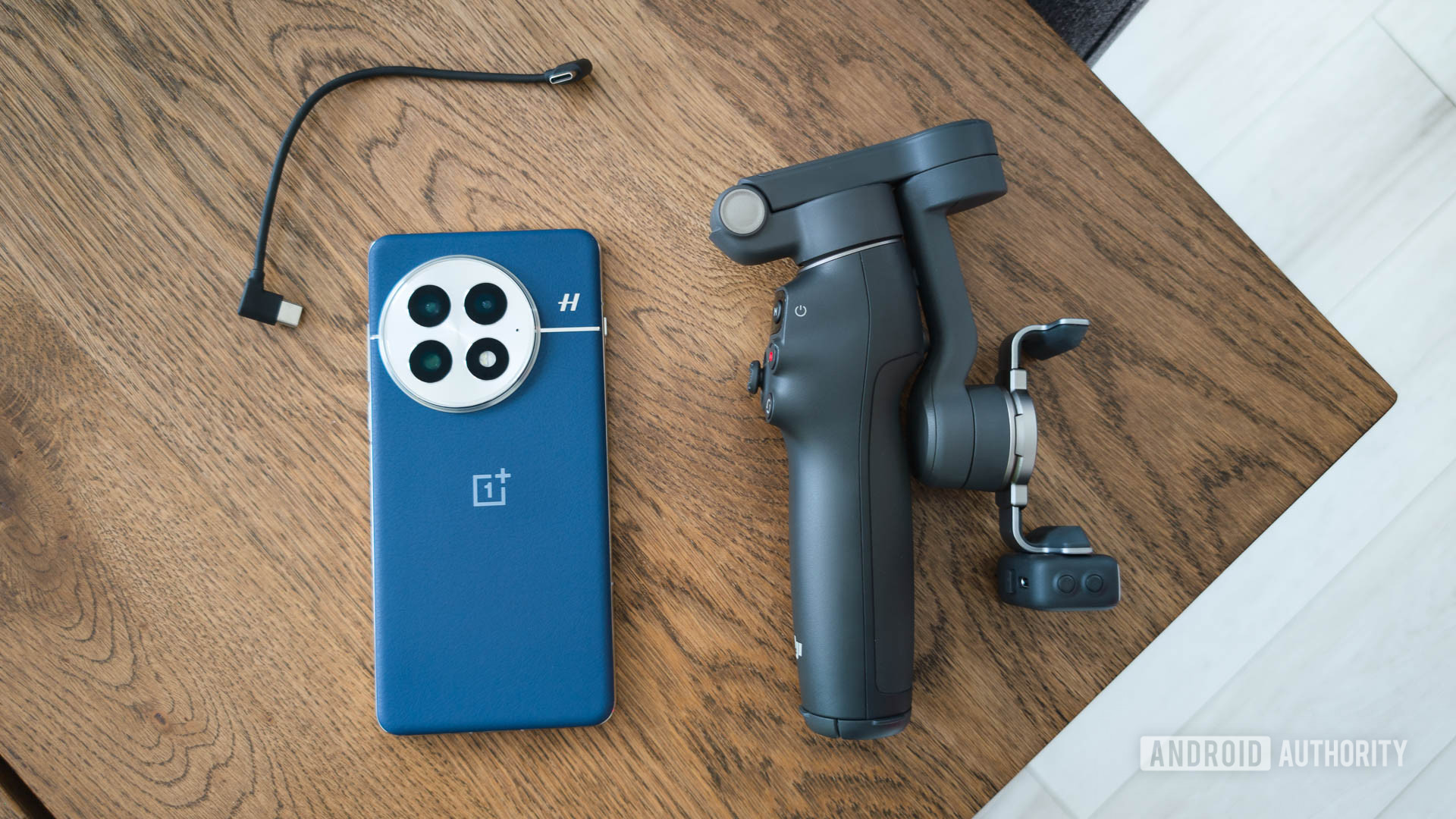 DJI Osmo Mobile 7P Gimbal with OnePlus 13 and cable for a complete videography kit