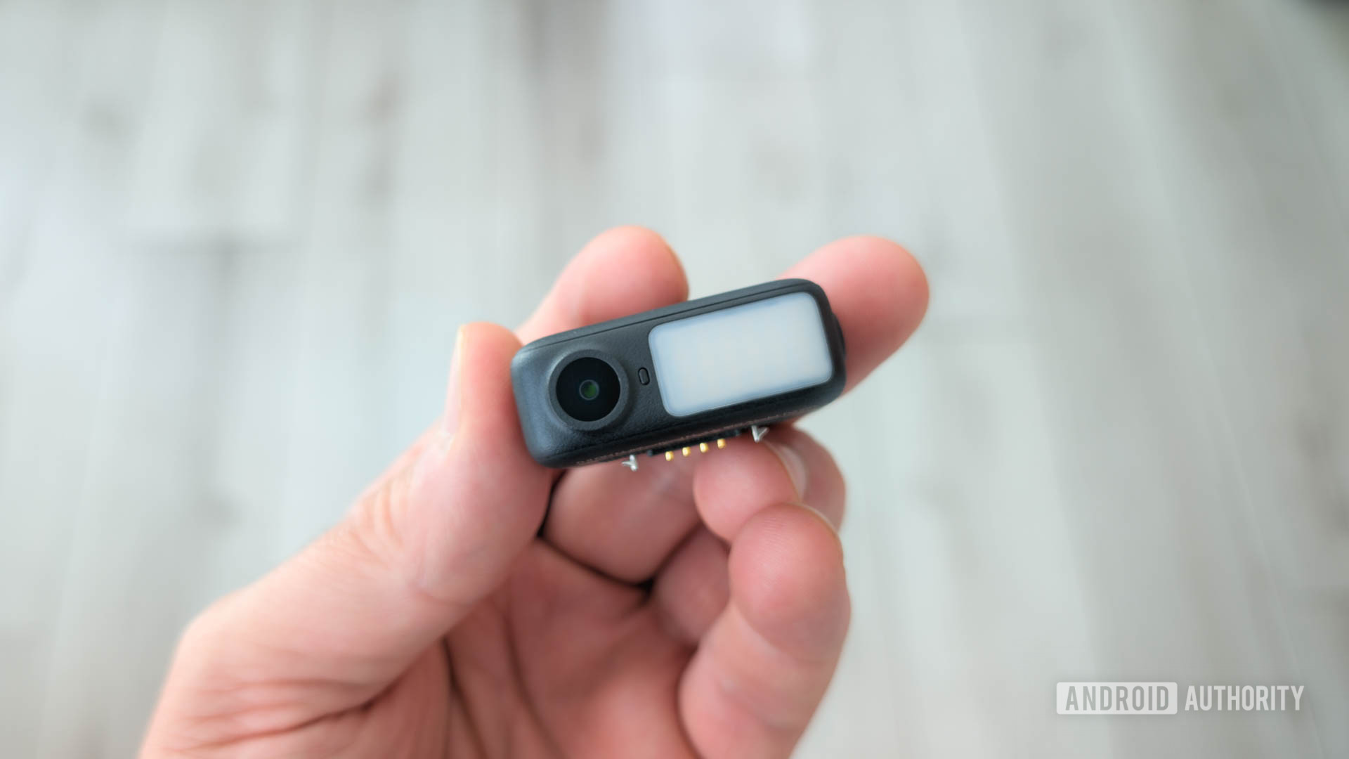 DJI Osmo Mobile 7P Multifunction Module in hand