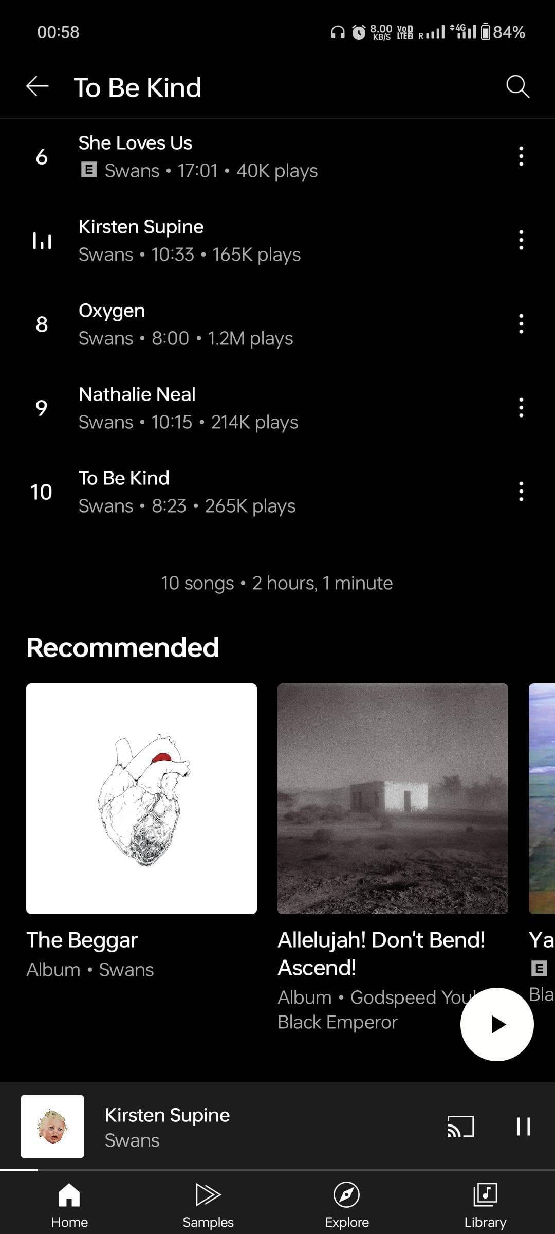 YouTube Music album page with Recommended albums carousel